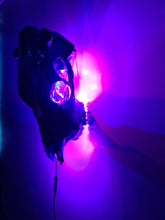 Load image into Gallery viewer, Large genuine cow skull backlit & painted with black/chameleon resin by me