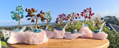 CRYSTAL TREES ON ROSE QUARTZ