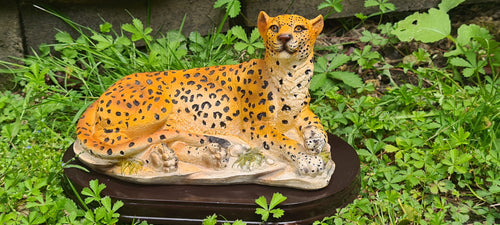 RESTING LEOPARD STATUE