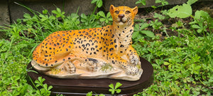 RESTING LEOPARD STATUE