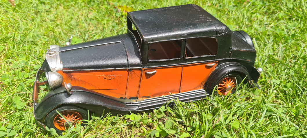 ORANGE ROLLS ROYCE TIN CAR